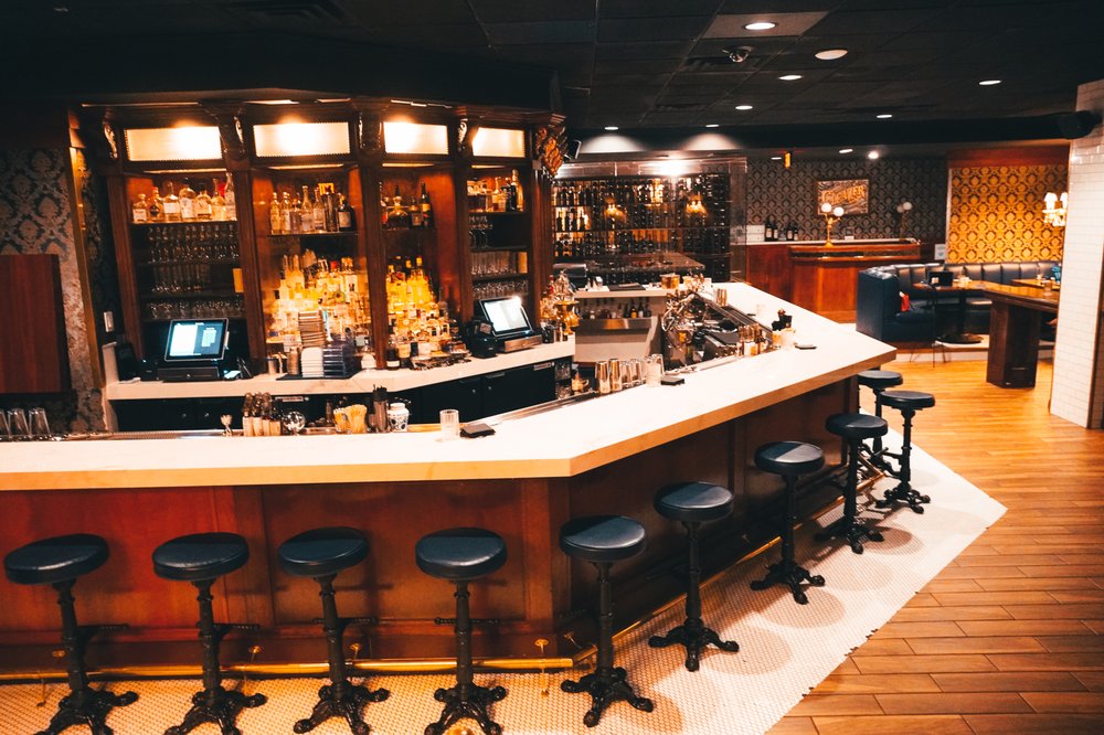 Interior of Cleaver Steakhouse in Las Vegas with modern decor and plush seating.